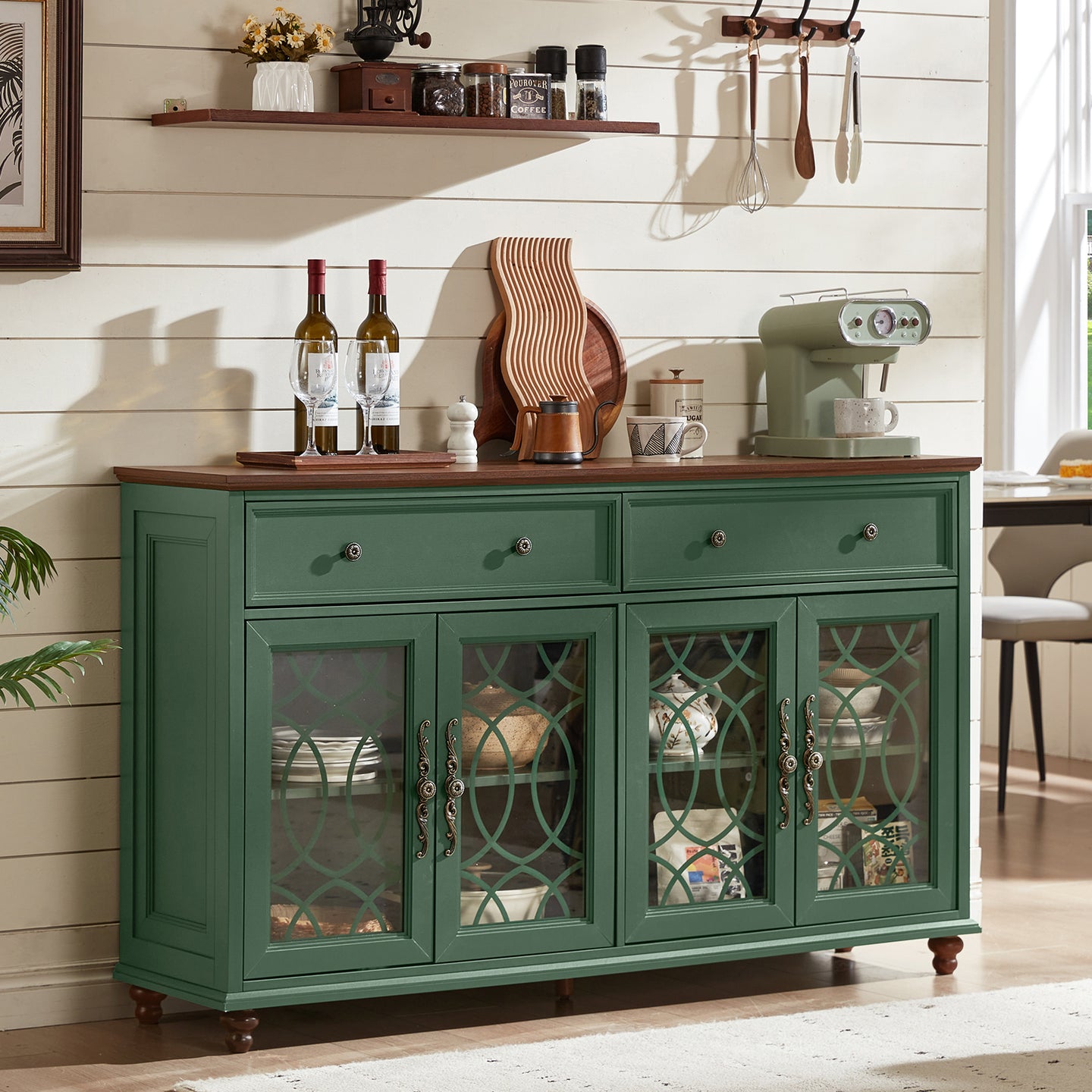 Green sideboard cabinet with glass doors and multiple drawers, wood base and legs