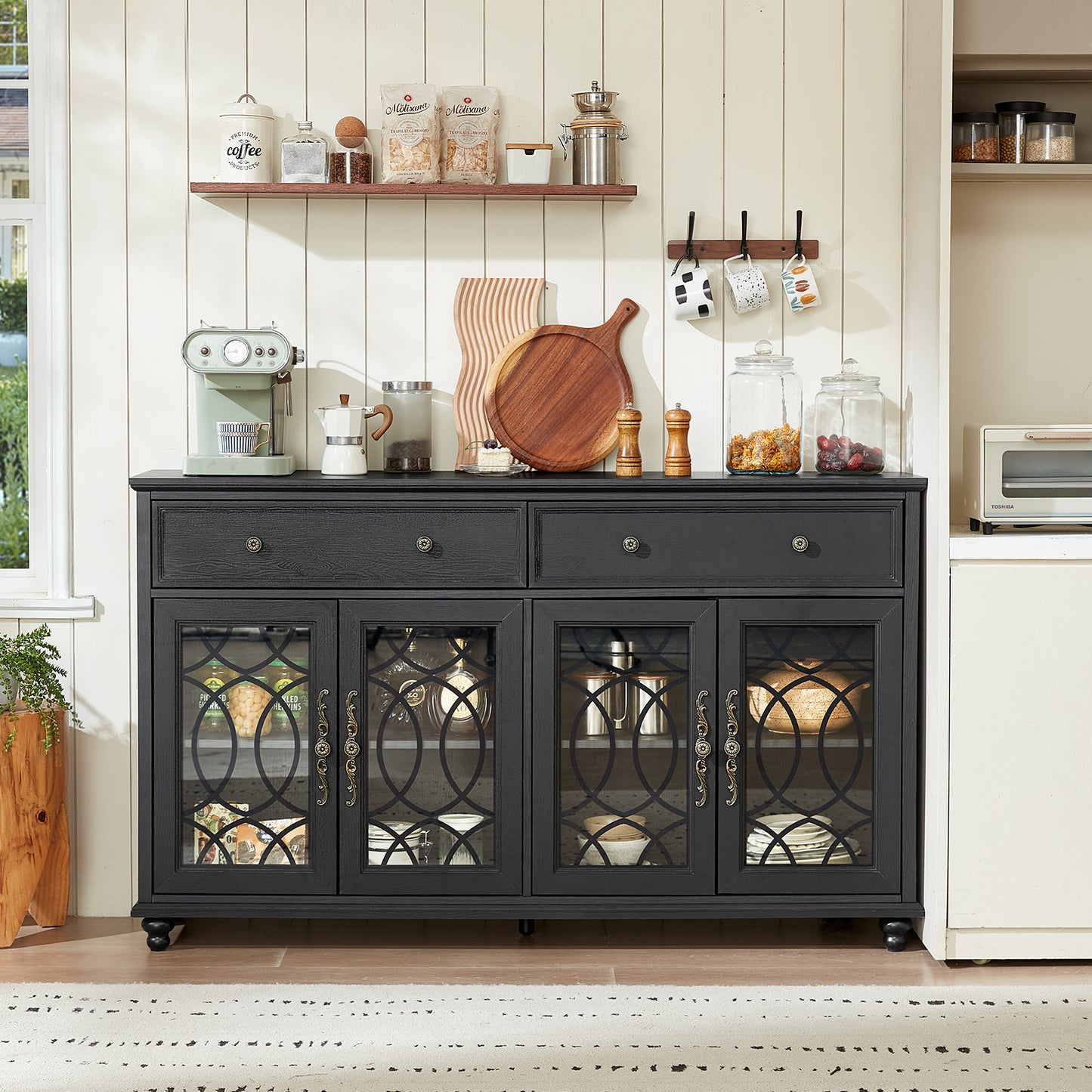 Black farmhouse sideboard cabinet with two drawers, four glass doors, and caster feet