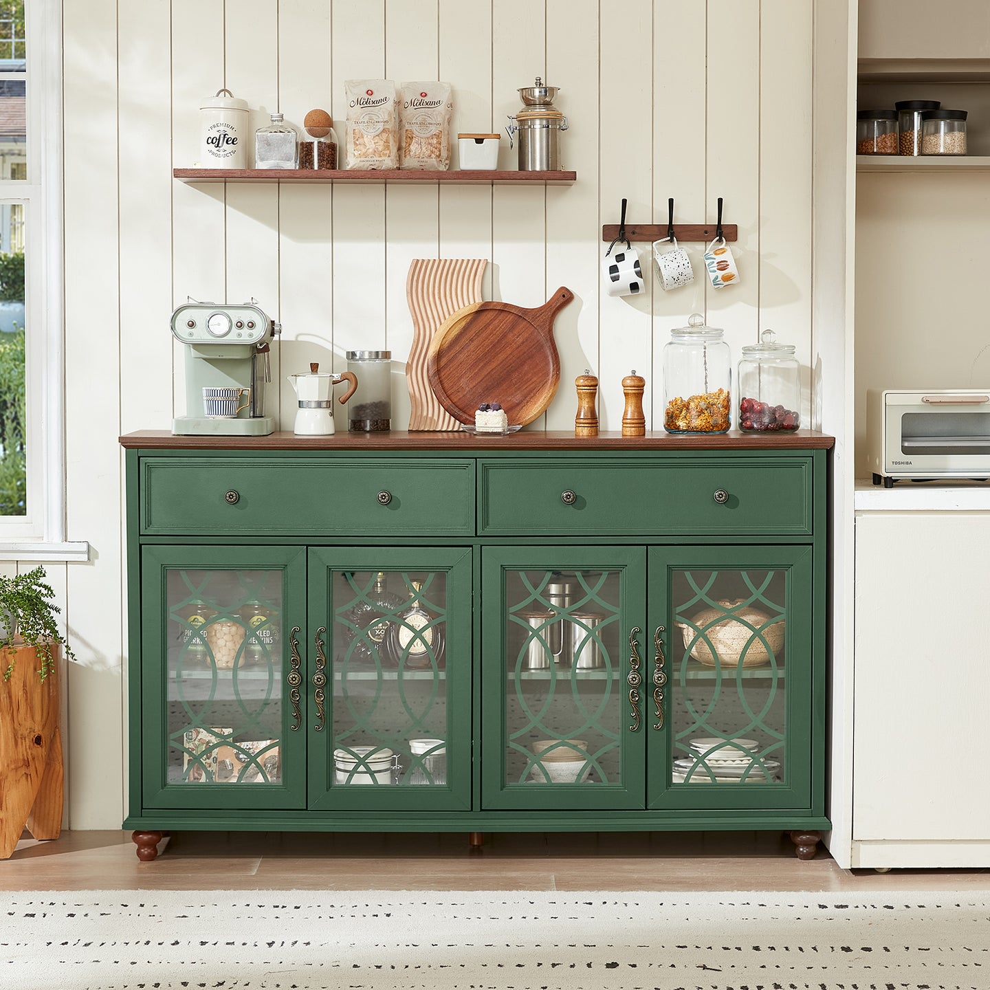 Green sideboard buffet cabinet with glass doors and drawers, wood top and turned legs