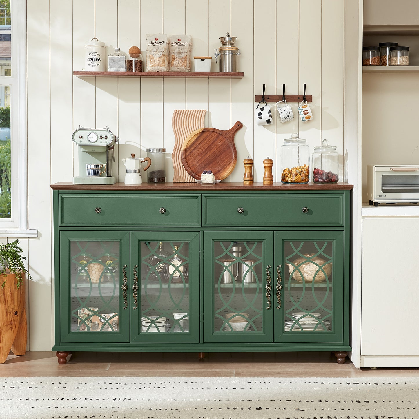 Green sideboard buffet cabinet with glass doors and drawers, wood top and turned legs