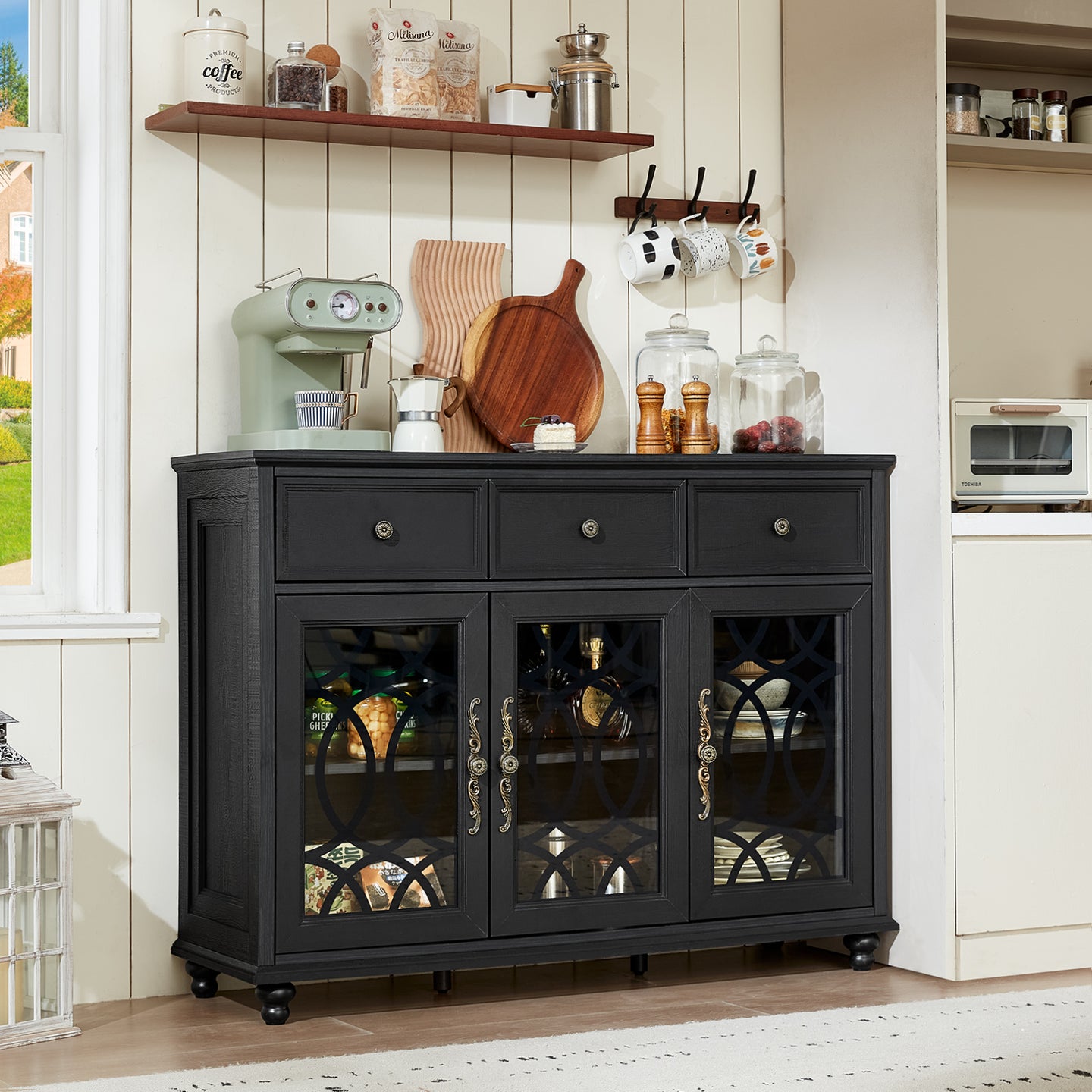 Black kitchen coffee bar cabinet with drawers and three glass doors with wrought handles