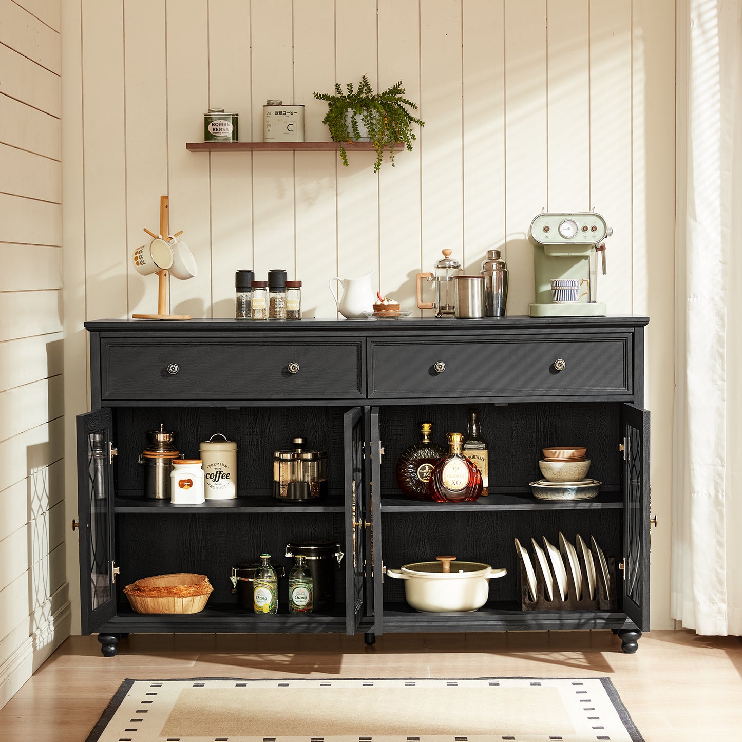 Black sideboard cabinet with double doors open, shelves filled with kitchen cookware