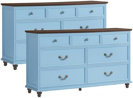 Blue nightstand set with multiple drawers and round knob pulls on caster feet