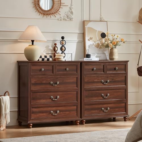 Brown farmhouse nightstand set, three-drawer chests with brass-tone knobs and bun feet