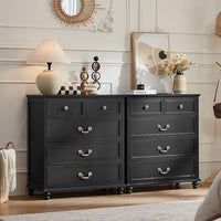 Dark gray farmhouse nightstand set, three-drawer chests with brass-tone knobs and feet