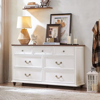 Farmhouse nightstand with multiple drawers, white finish and brass-toned pulls