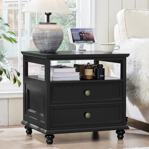 Black nightstand with two drawers and open shelf, brass knob pulls, turned legs