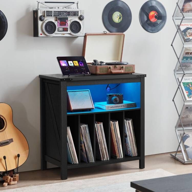 Black record player stand with blue LED interior and vinyl record storage shelves