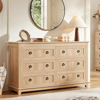 Natural wood dresser with six drawers and round metal knobs, wide top surface for decor