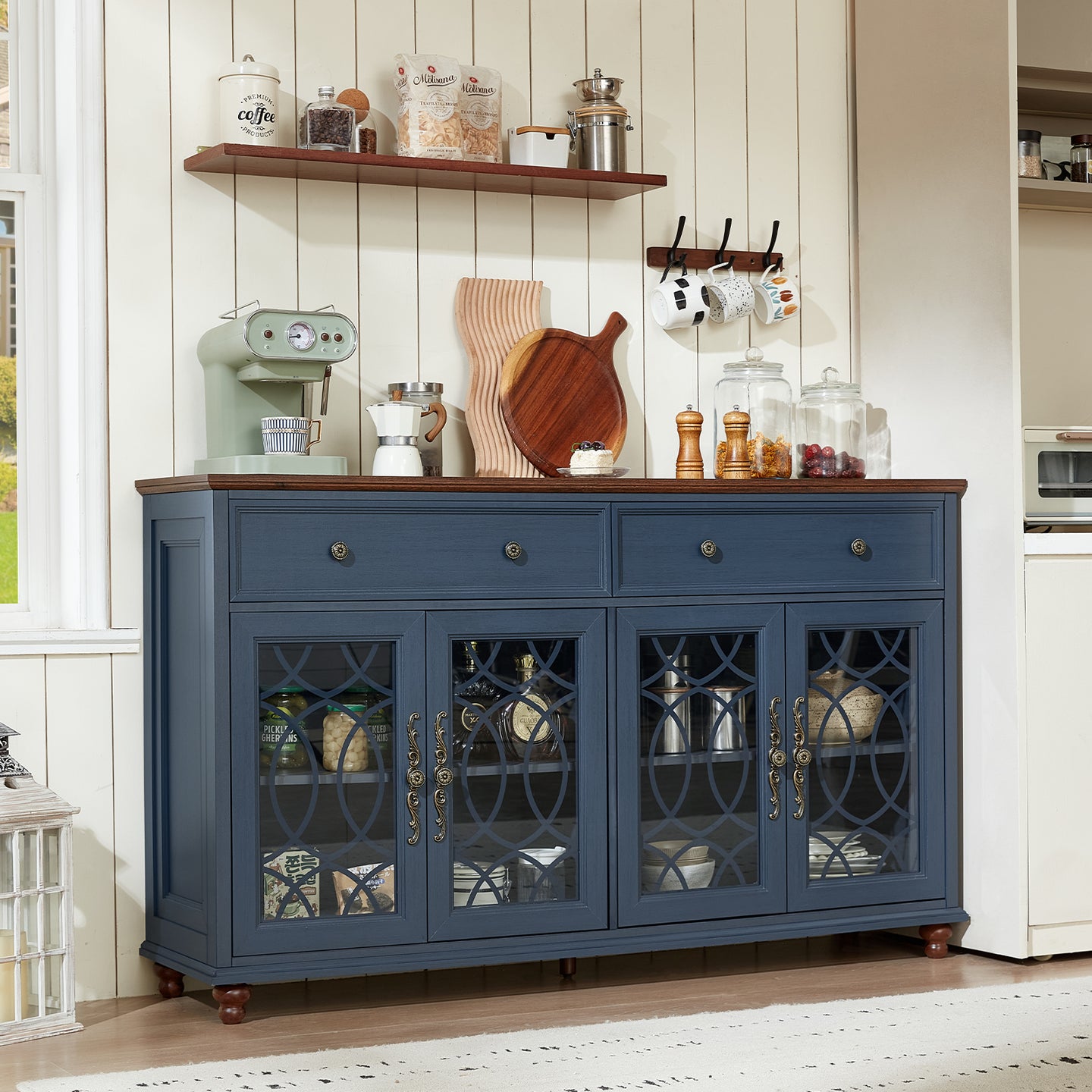 Blue sideboard cabinet with three drawers and arched glass door panels