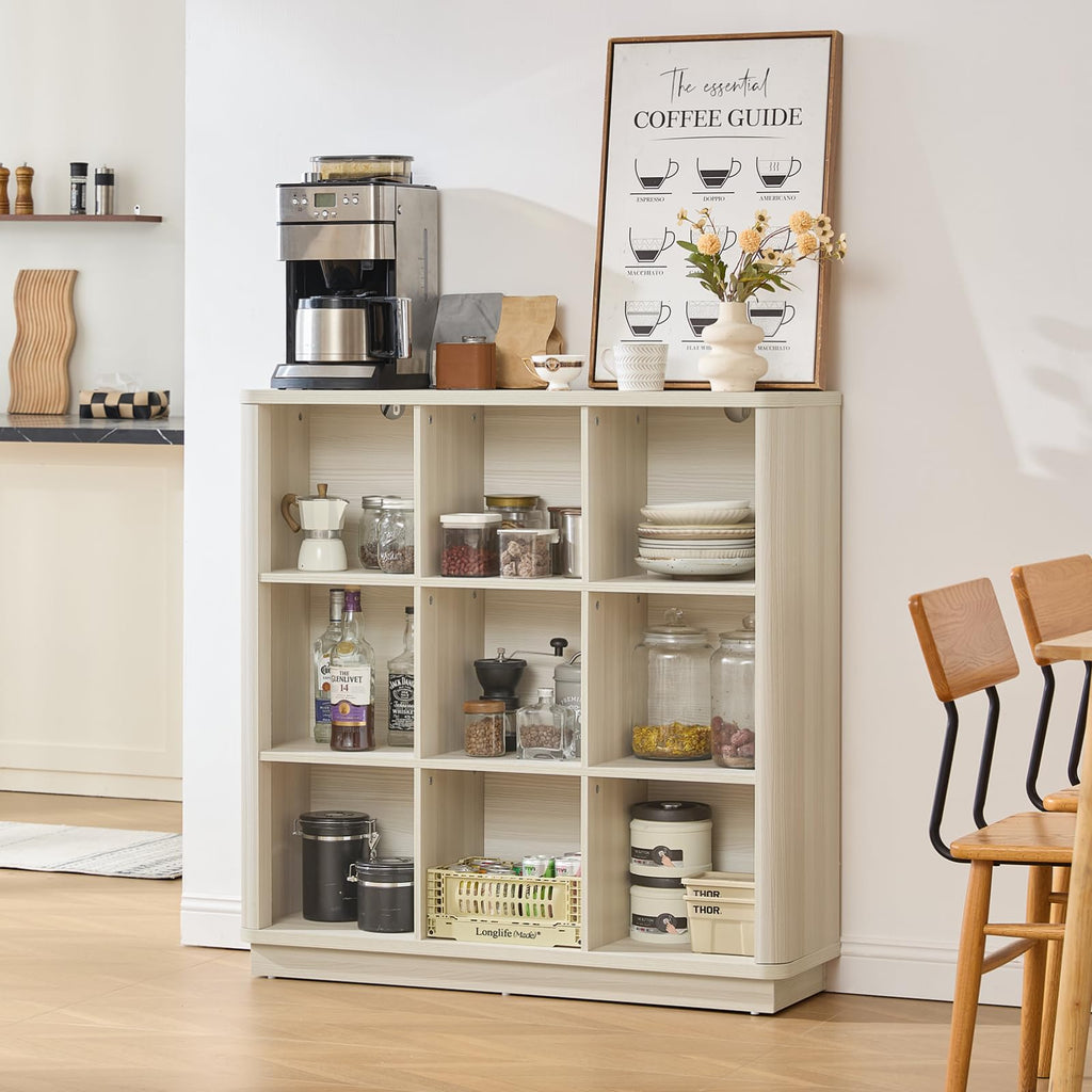 Natural oak cube storage book shelf with open cubbies holding jars and tableware