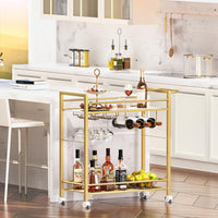 Gold rolling 2-tier bar cart with wine rack, hanging glassware, and bottle storage shelves.