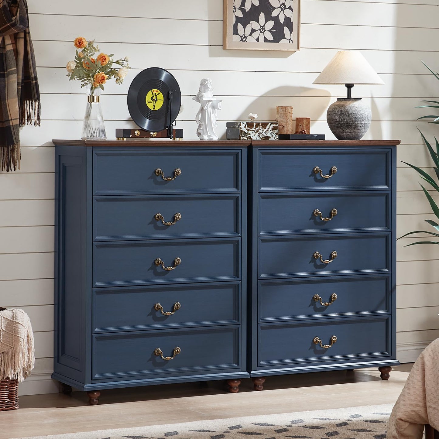 Navy blue farmhouse 5-drawer dresser with brass-tone handles and two-door panel base