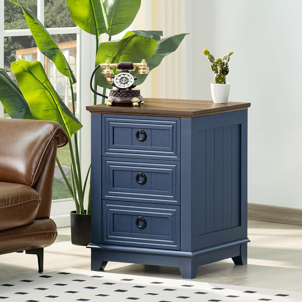 Navy bedside cabinet with wood top and three drawers, metal ring pulls