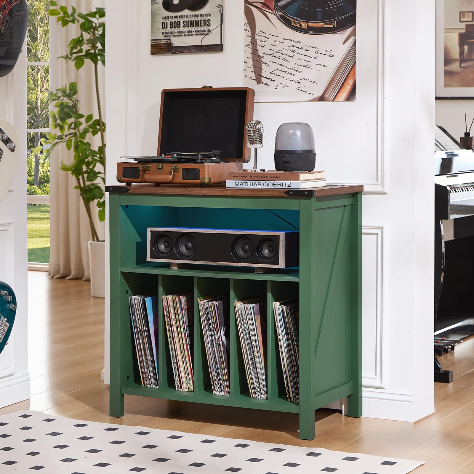 Green record player cabinet with open vinyl storage and turntable on top