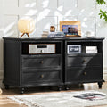 Navy blue farmhouse dresser with four drawers and round knobs on short feet