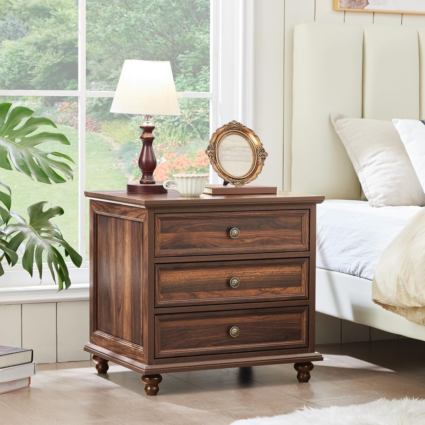 Rustic farmhouse dresser with three drawers and round metal knobs, dark brown wood
