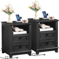 Black wooden nightstands set of 2 with charging area, open shelf, and two drawers