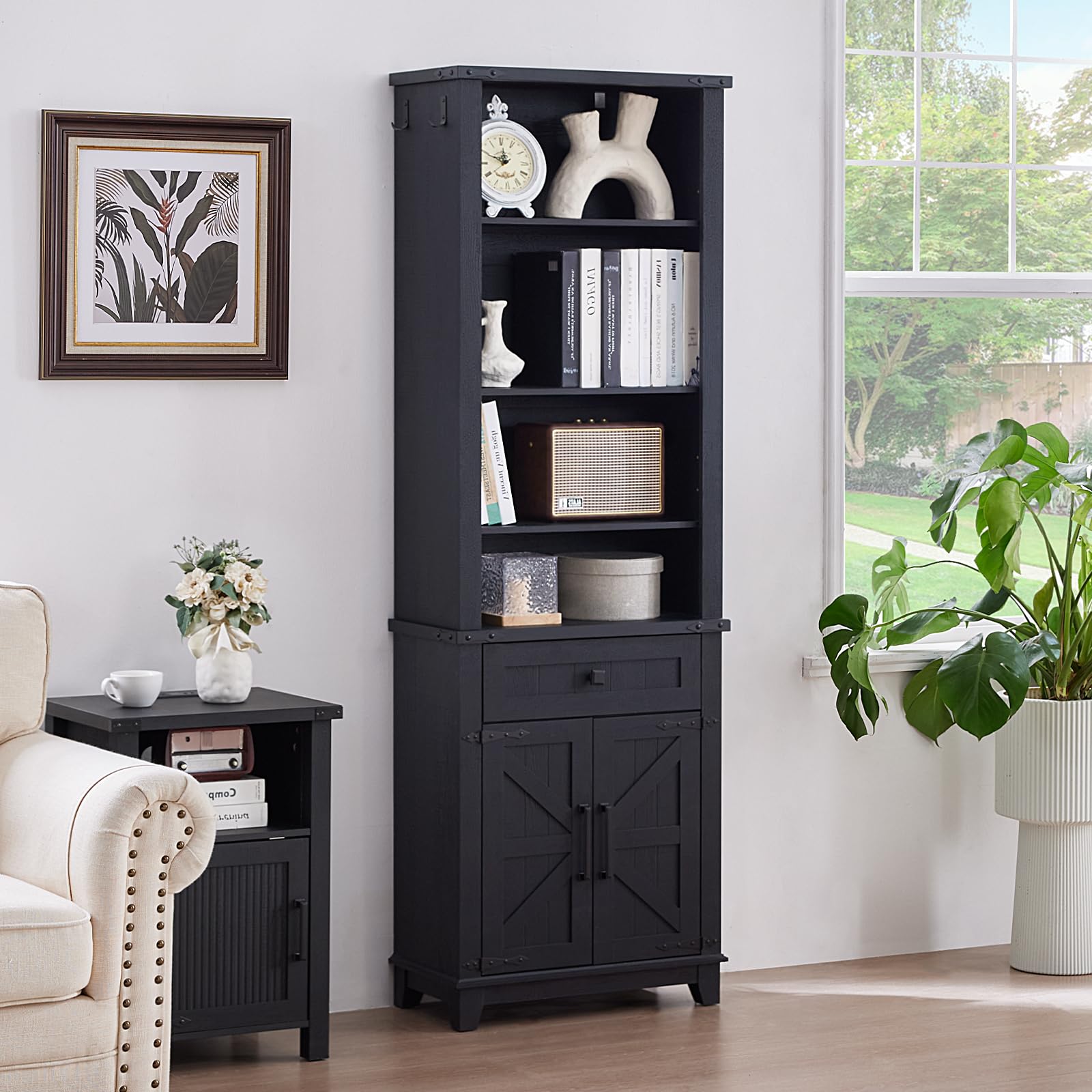 Black tall bookcase with open shelves and barn-style cabinet doors
