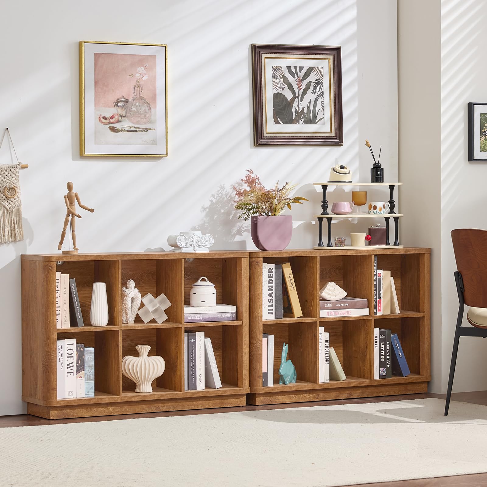 Natural oak low 8-cube bookcase with open cubbies and decorative items