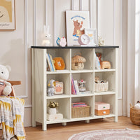 White farmhouse bookcase cabinet with open cubbies and four short legs, media and decor storage