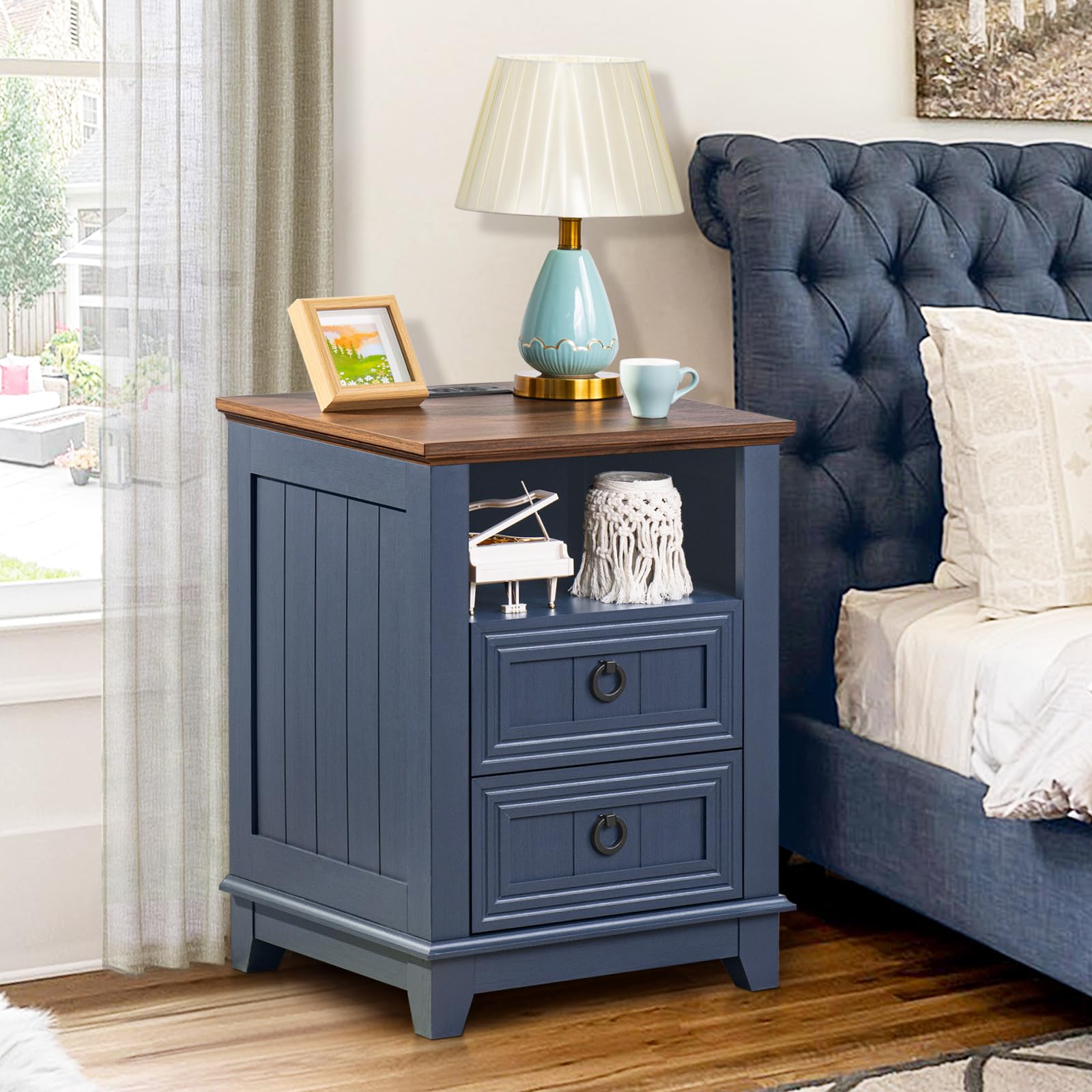 Blue nightstand with wood tabletop and three stacked drawers with round metal pulls