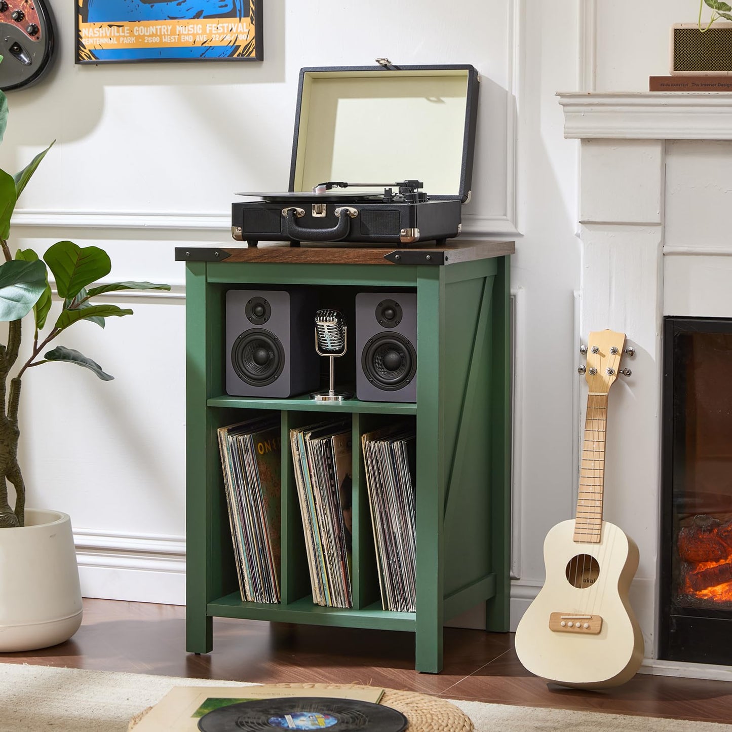 Record player stand with green cabinet and wood top; open vinyl storage with record sleeves