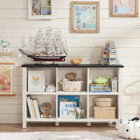 White low bookcase with open shelves for books and decorative display items