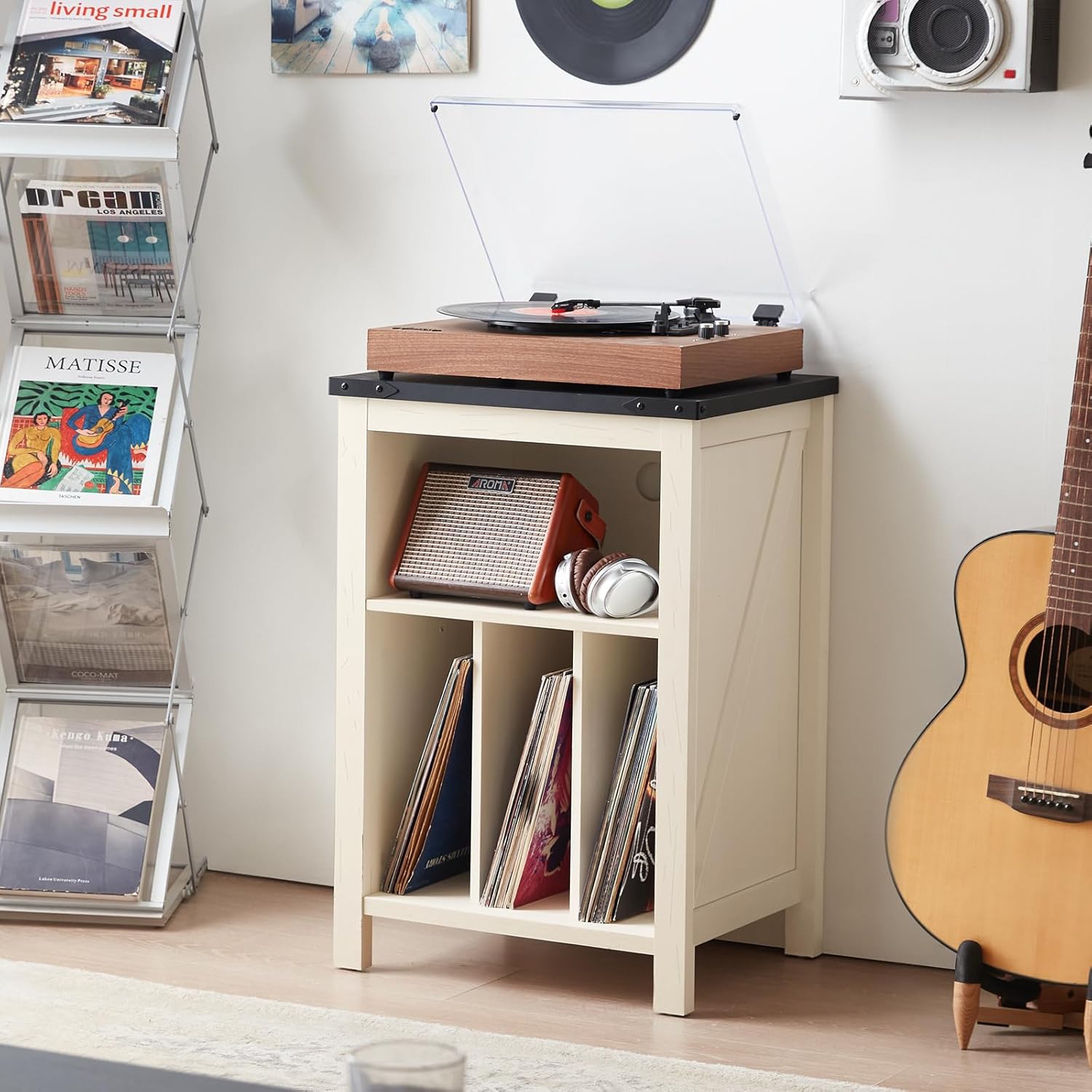 White record player stand cabinet with open lid, vinyl records in lower shelves