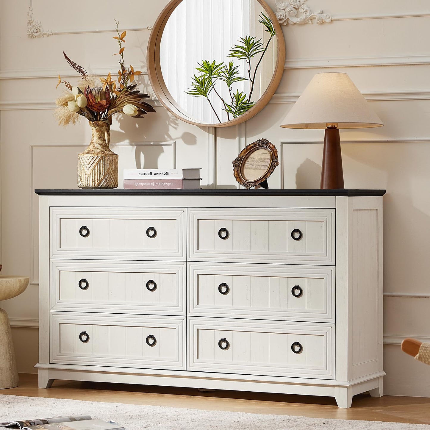 White wood dresser with six drawers and round metal knobs, sturdy base and flat tabletop