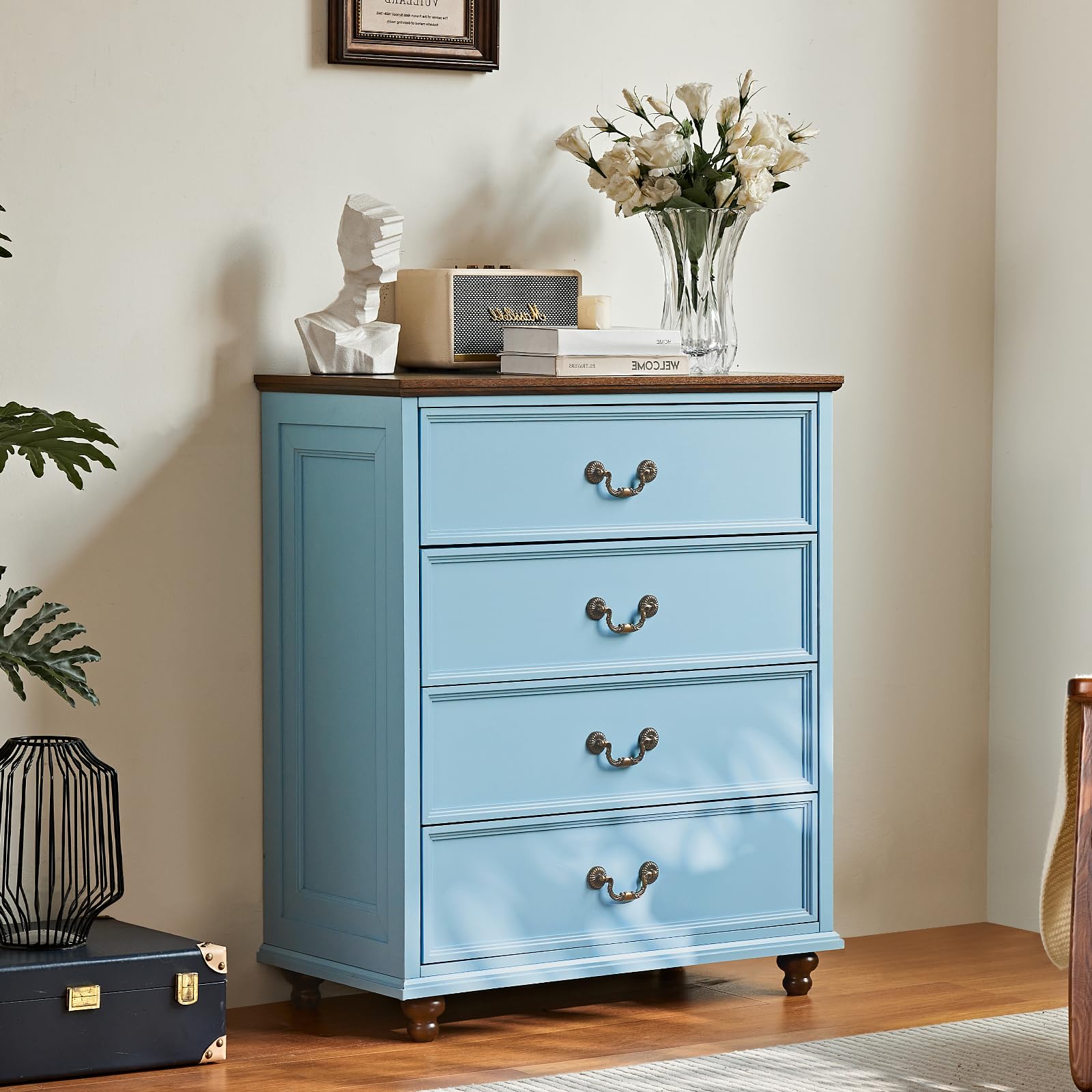 Wood dresser with four drawers, light blue finish and metal knob pulls