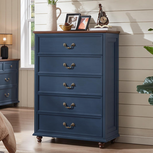 Navy blue 5-drawer dresser with brass knobs and four turned wooden feet