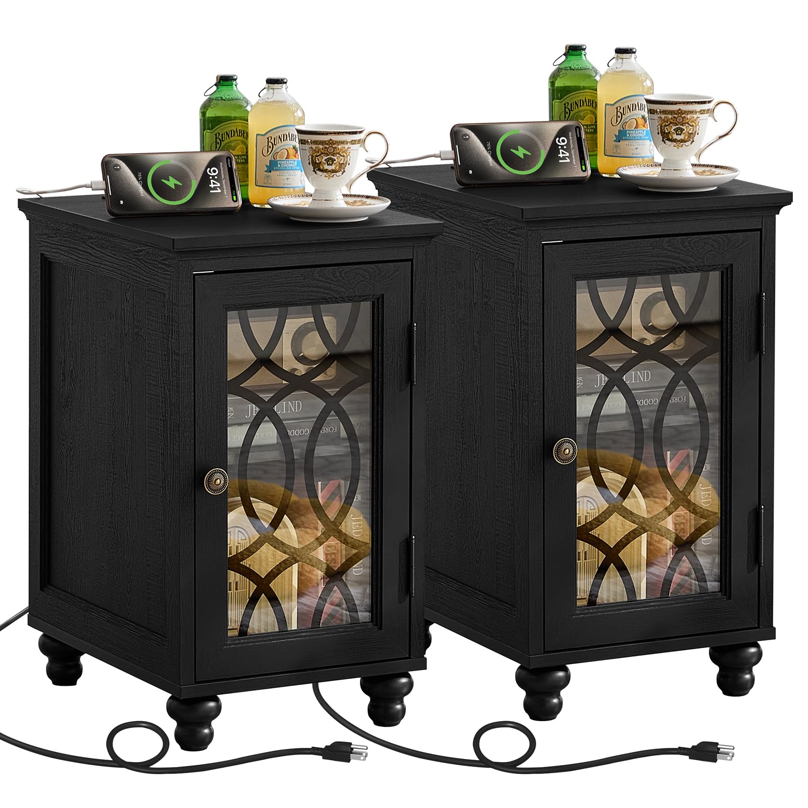 Pair of dark wood nightstands with glass cabinet doors and visible power cords.