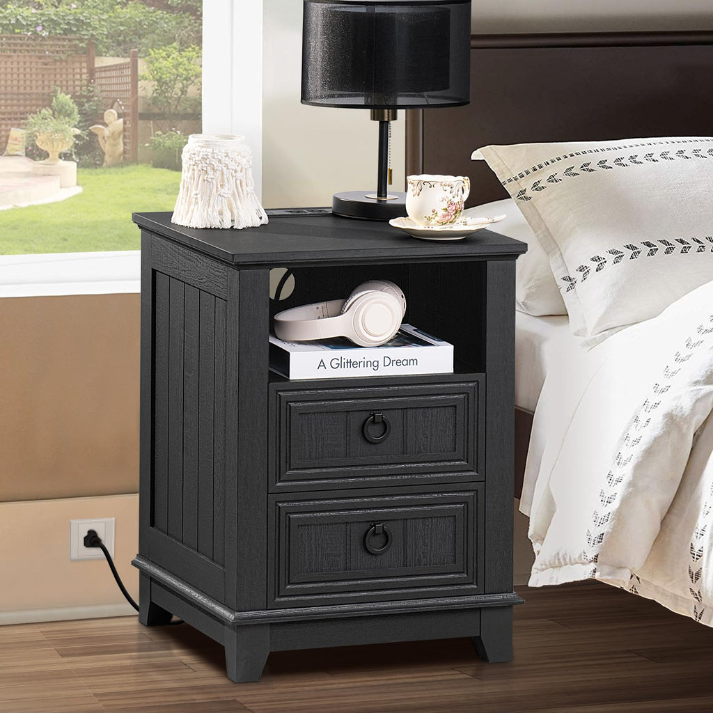 Black farmhouse nightstand cabinet with 3 drawers, round metal knobs, open media space inside.