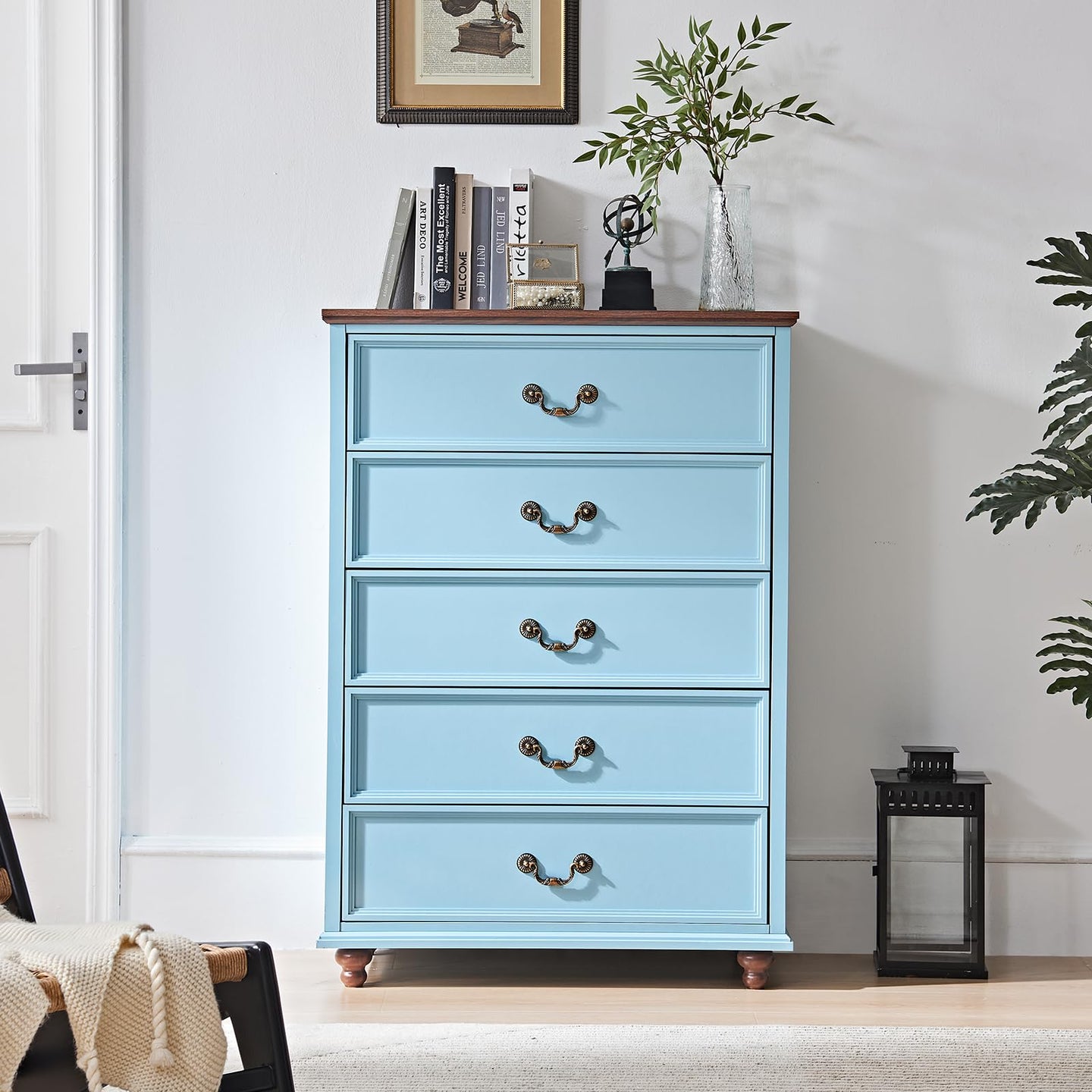 Blue farmhouse 5-drawer dresser with brass knob pulls and dark wood top