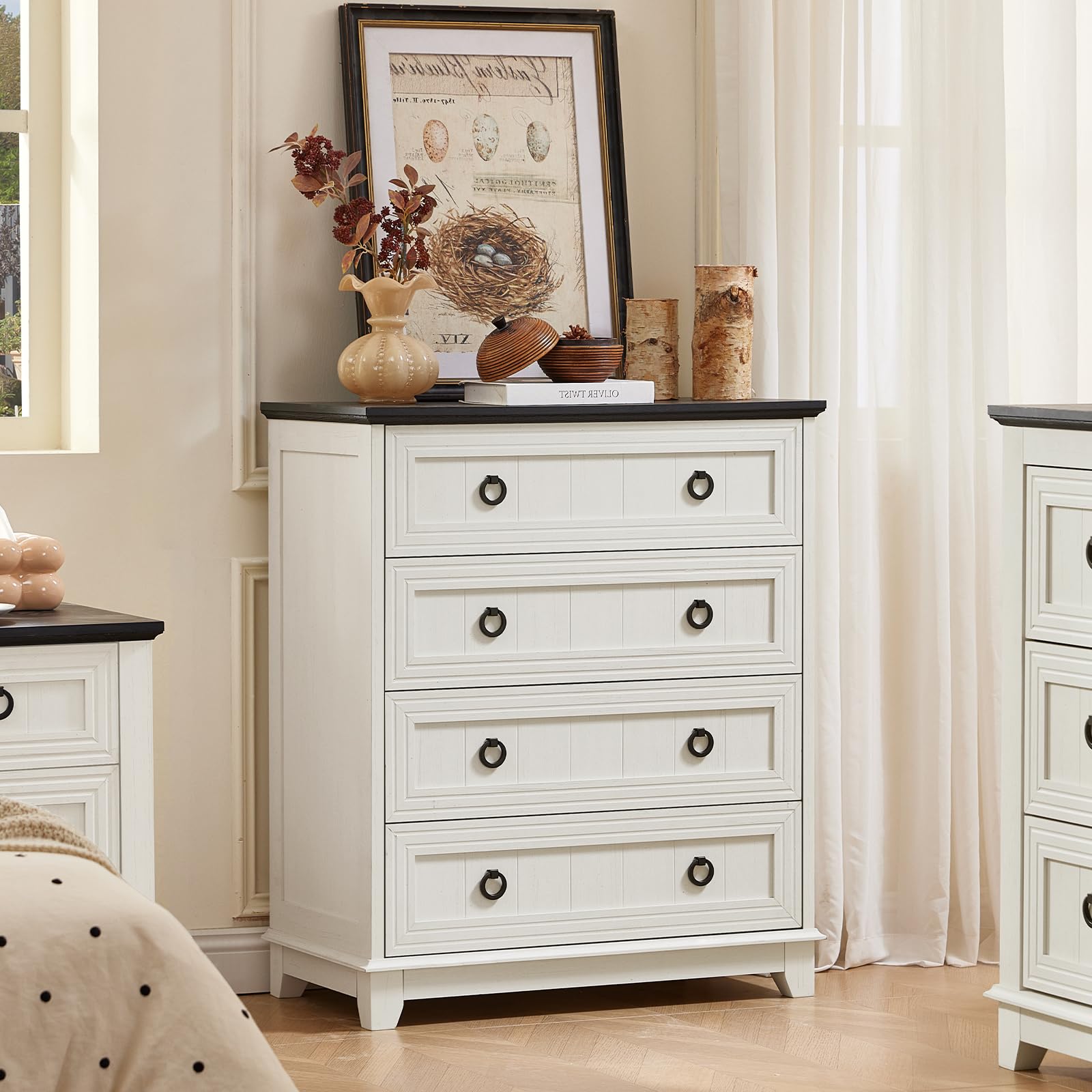 White painted dresser with five drawers and round metal knobs, farmhouse style.