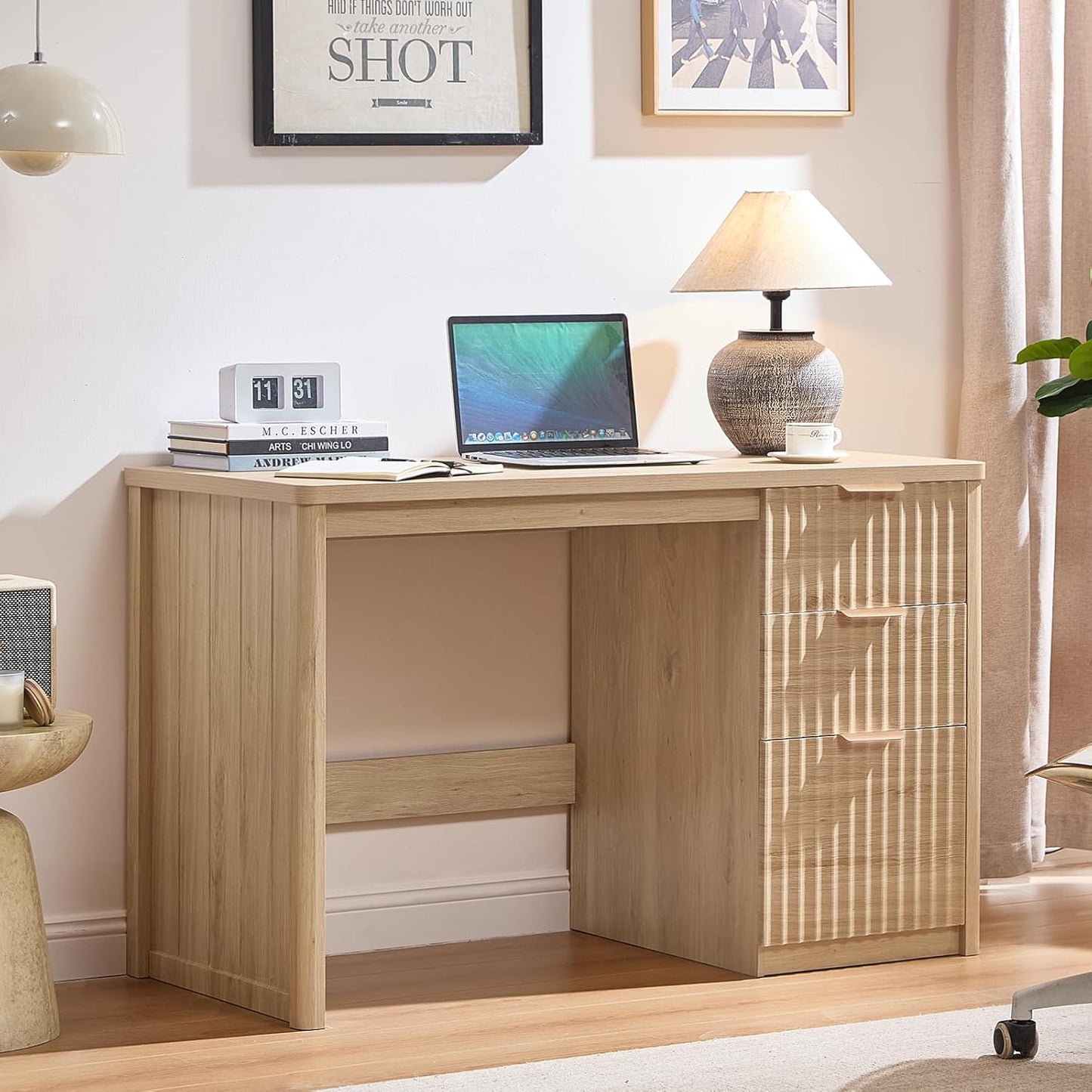 Natural wood executive desk with fluted side cabinet and three drawers, metal handles