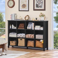 Dark low bookcase with open storage compartments and bottom legs for display