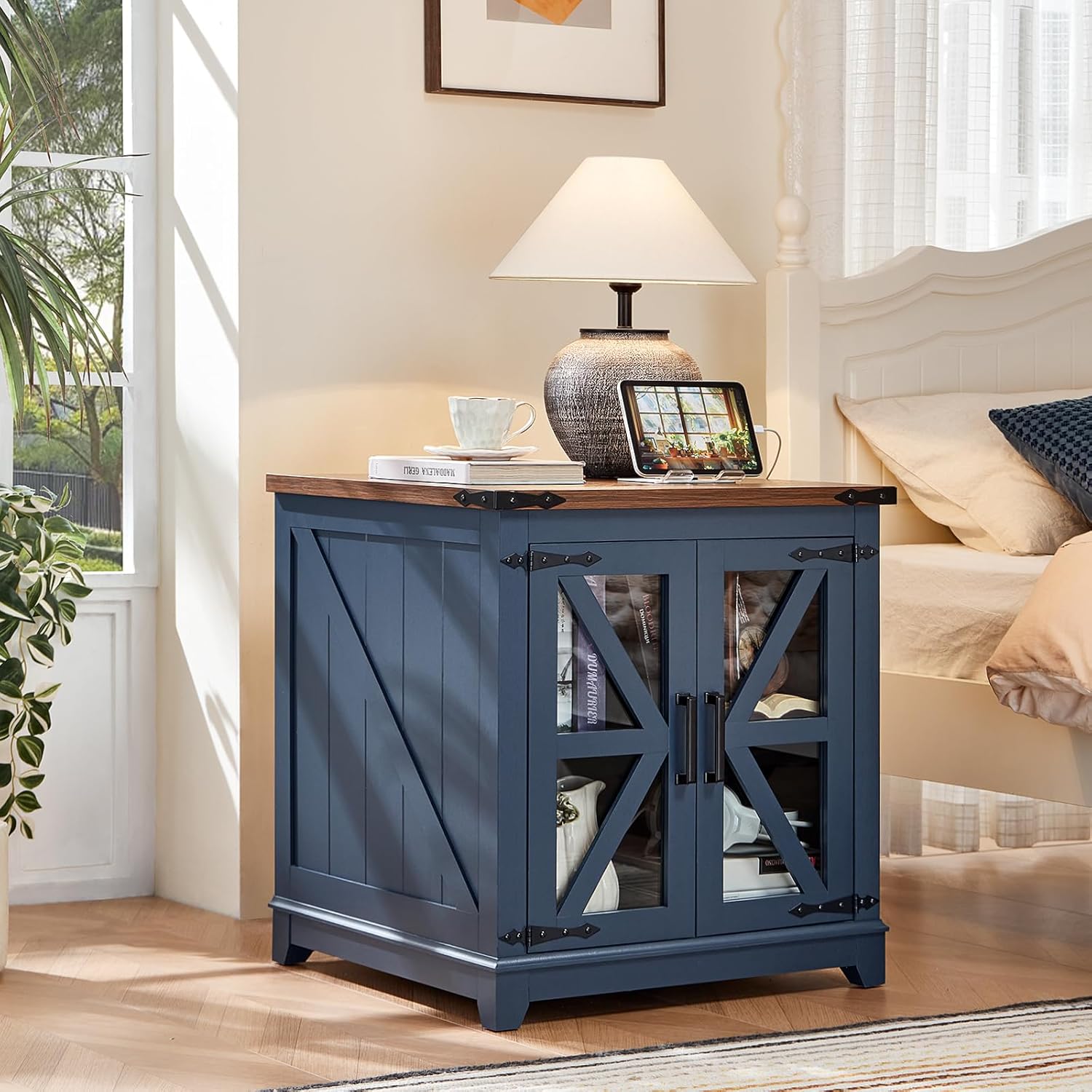Blue farmhouse end table with X-frame doors and warm wood top, open cubby below