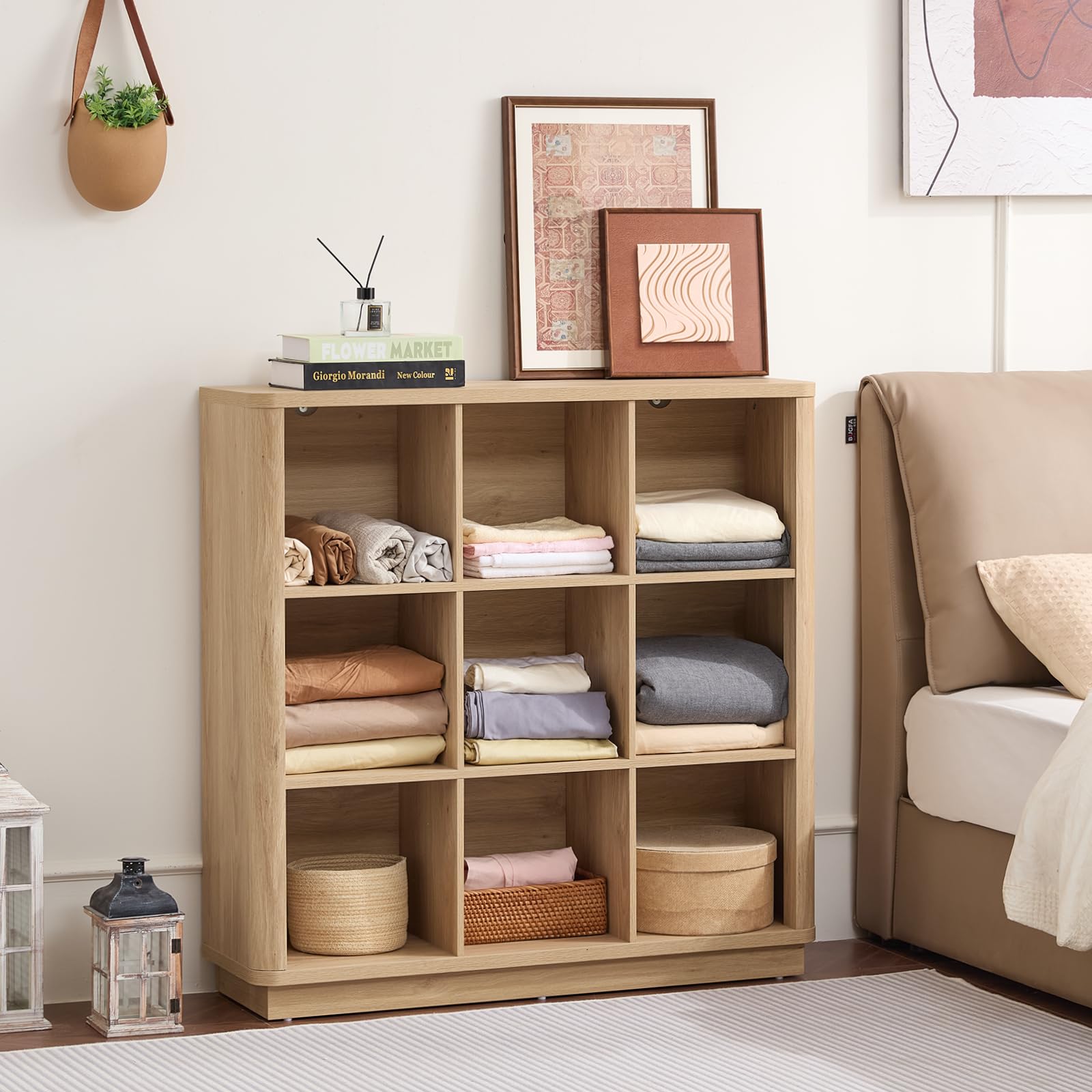 Light oak cube storage book shelf with open cubbies and tiered storage layout