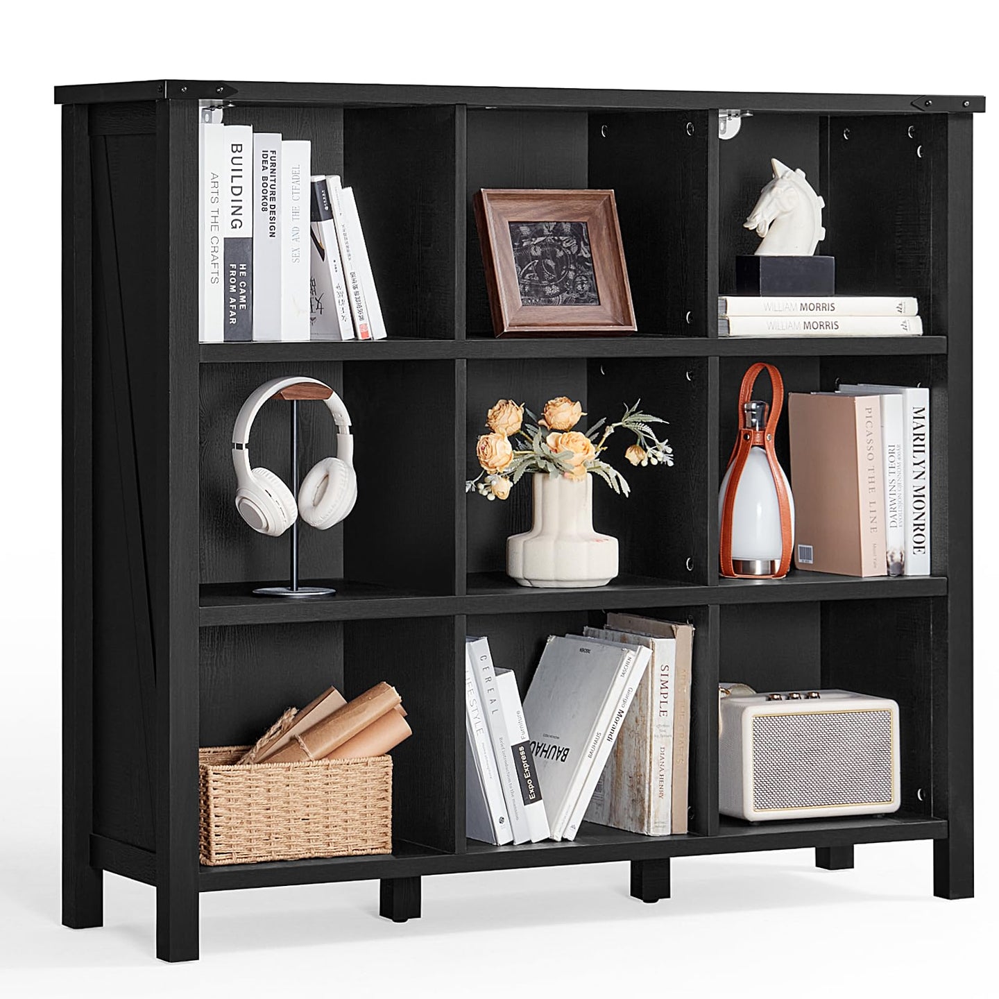 Black low storage bookcase with open compartments and display cubbies