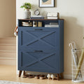 Navy shoe storage cabinet with two flip drawers and X-pattern doors, free-standing