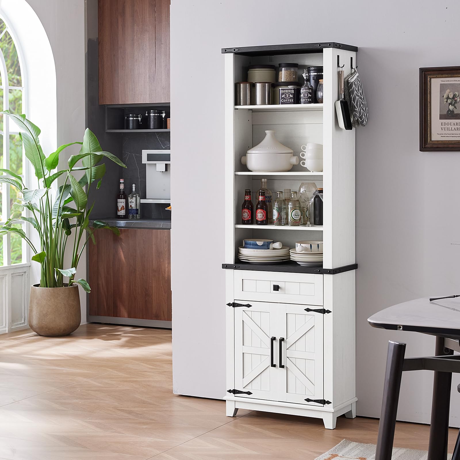 White tall bookcase with black top trim, glassware on open shelves, and cabinet doors