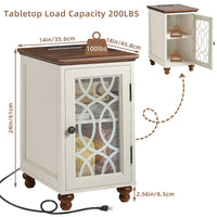 White narrow end table with lattice glass door, four turned legs, and visible power cord.