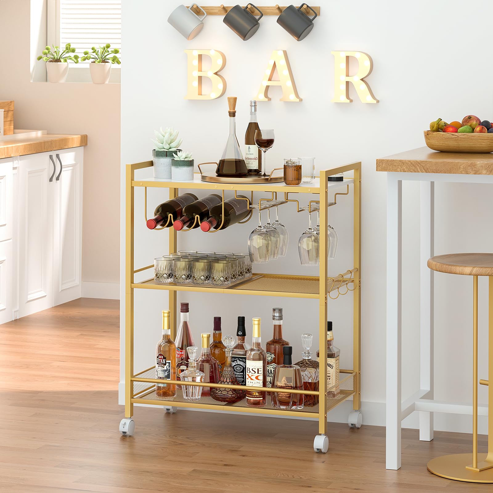 Gold bar cart with open 3-tier design, bottle rack, glass hooks, and swivel casters
