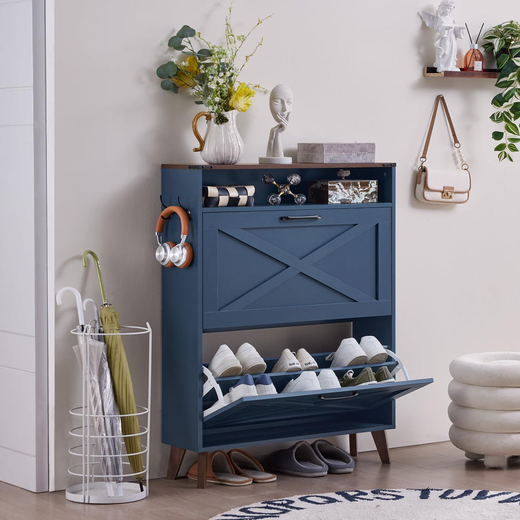 Navy shoe storage cabinet with open shelf and shoes arranged in flip drawers