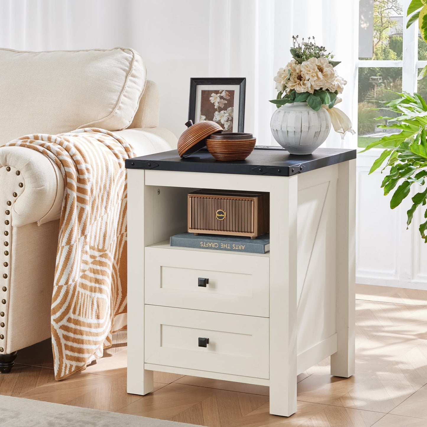 White nightstand with 2 drawers and open shelf, black top charging station