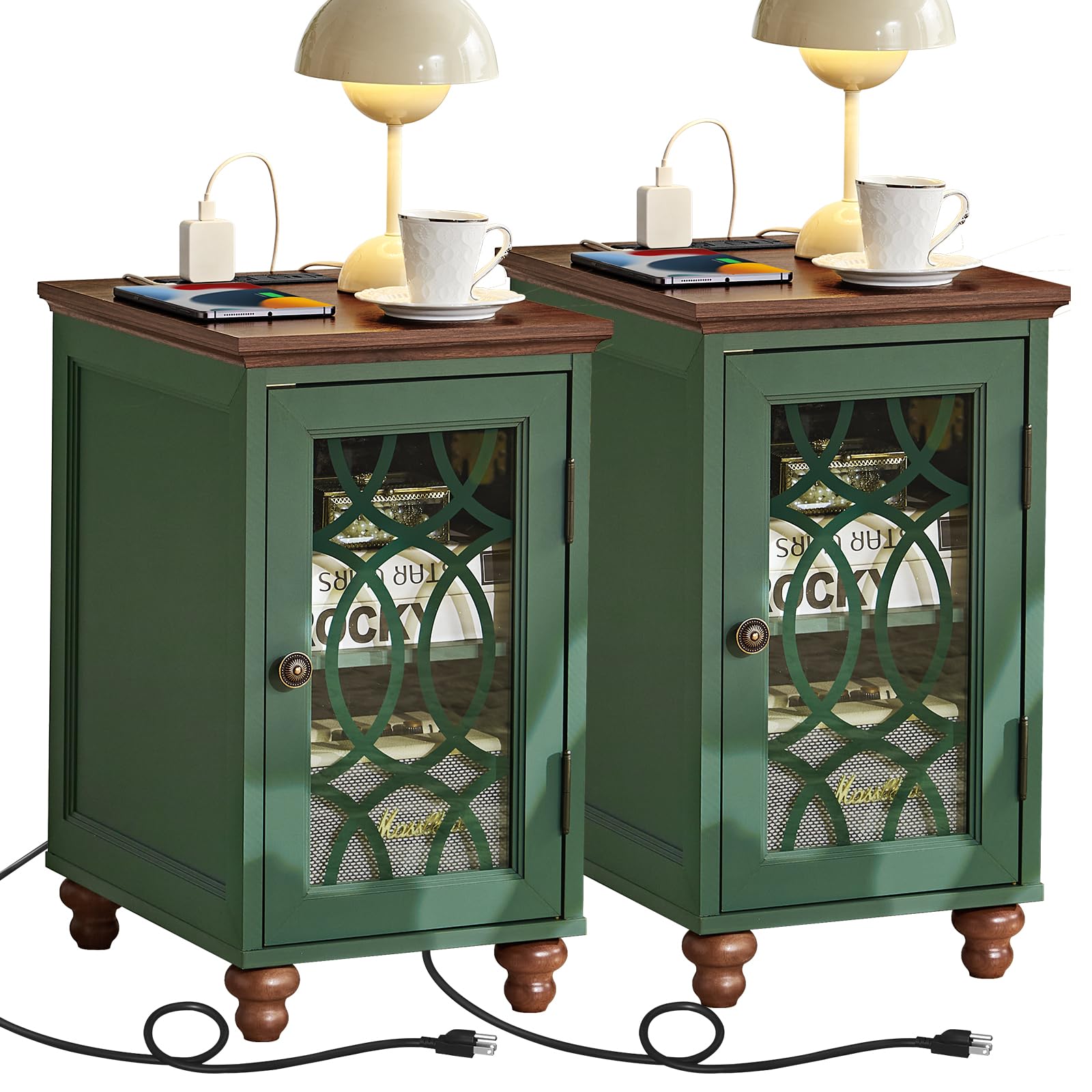 Green bedside end table set with glass cabinet doors and charging cords at base
