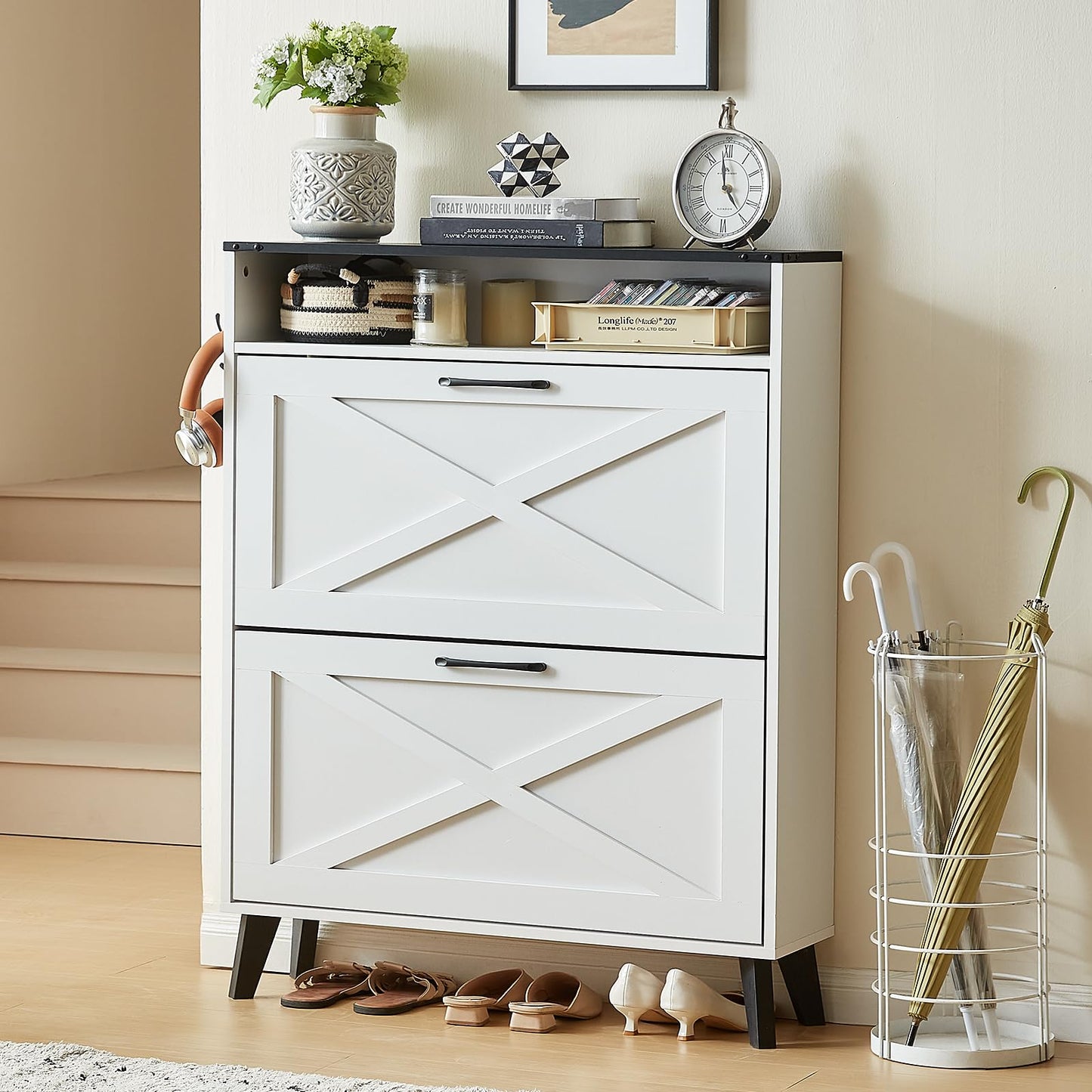 White shoe storage cabinet with X-pattern flip drawers and open shelf for shoes