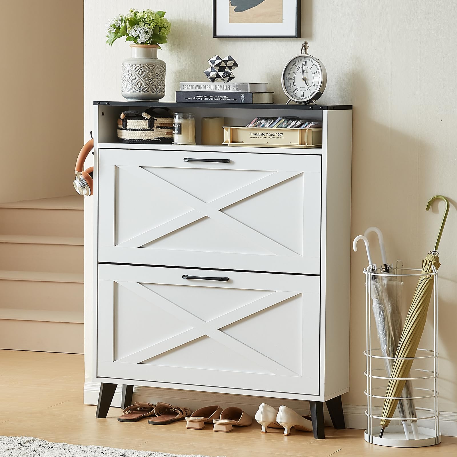 White shoe storage cabinet with two flip drawers and X-pattern door panels, free-standing